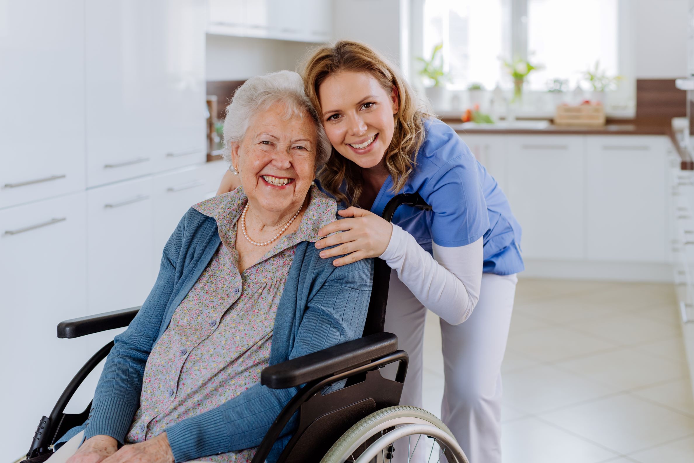 portrait-nurse-her-senior-client-wheelchair